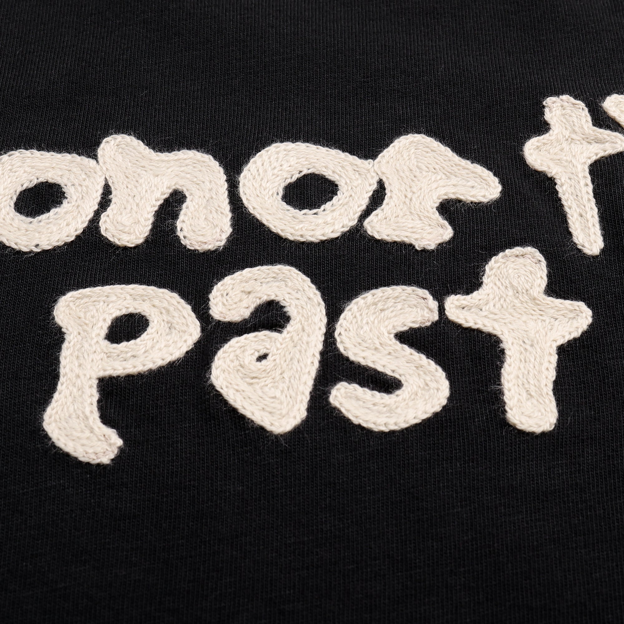 black and tan t-shirt detail