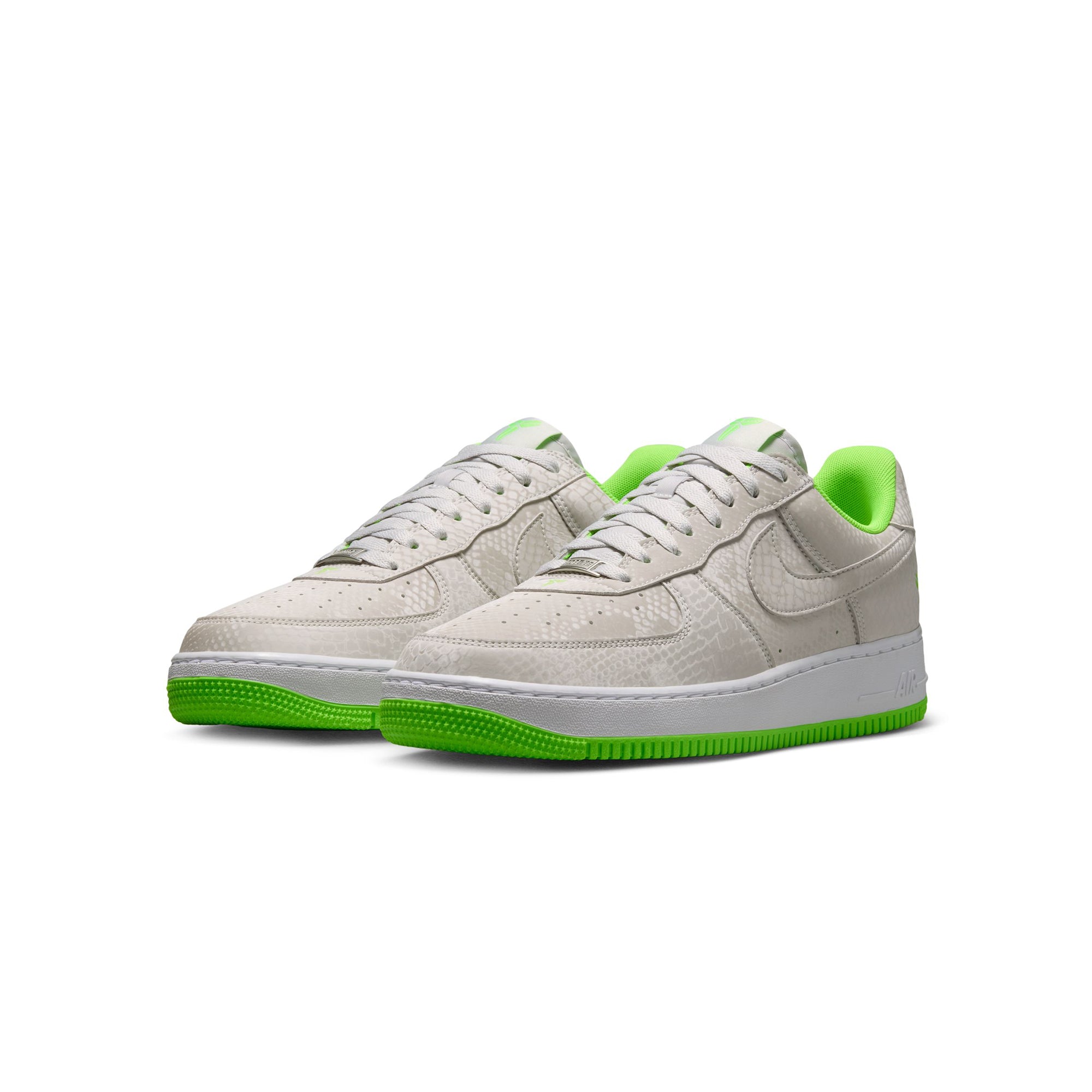 Vast Grey/electric Green-white Sneakers on a white background