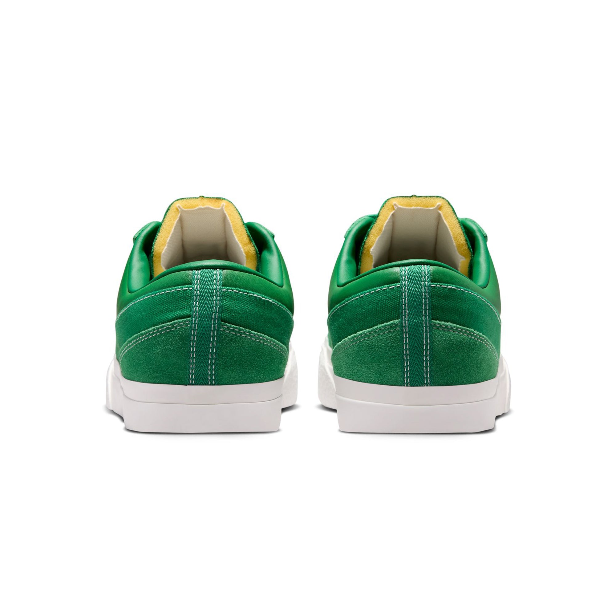 pine green and white sneakers on a white background