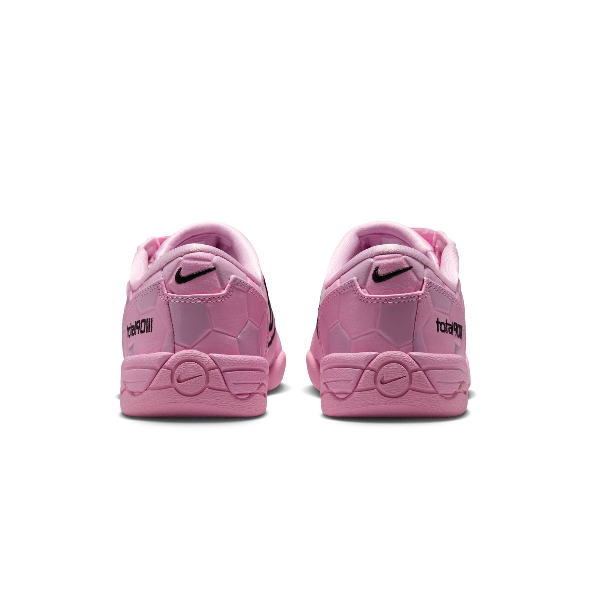 pink and black sneakers on a white background
