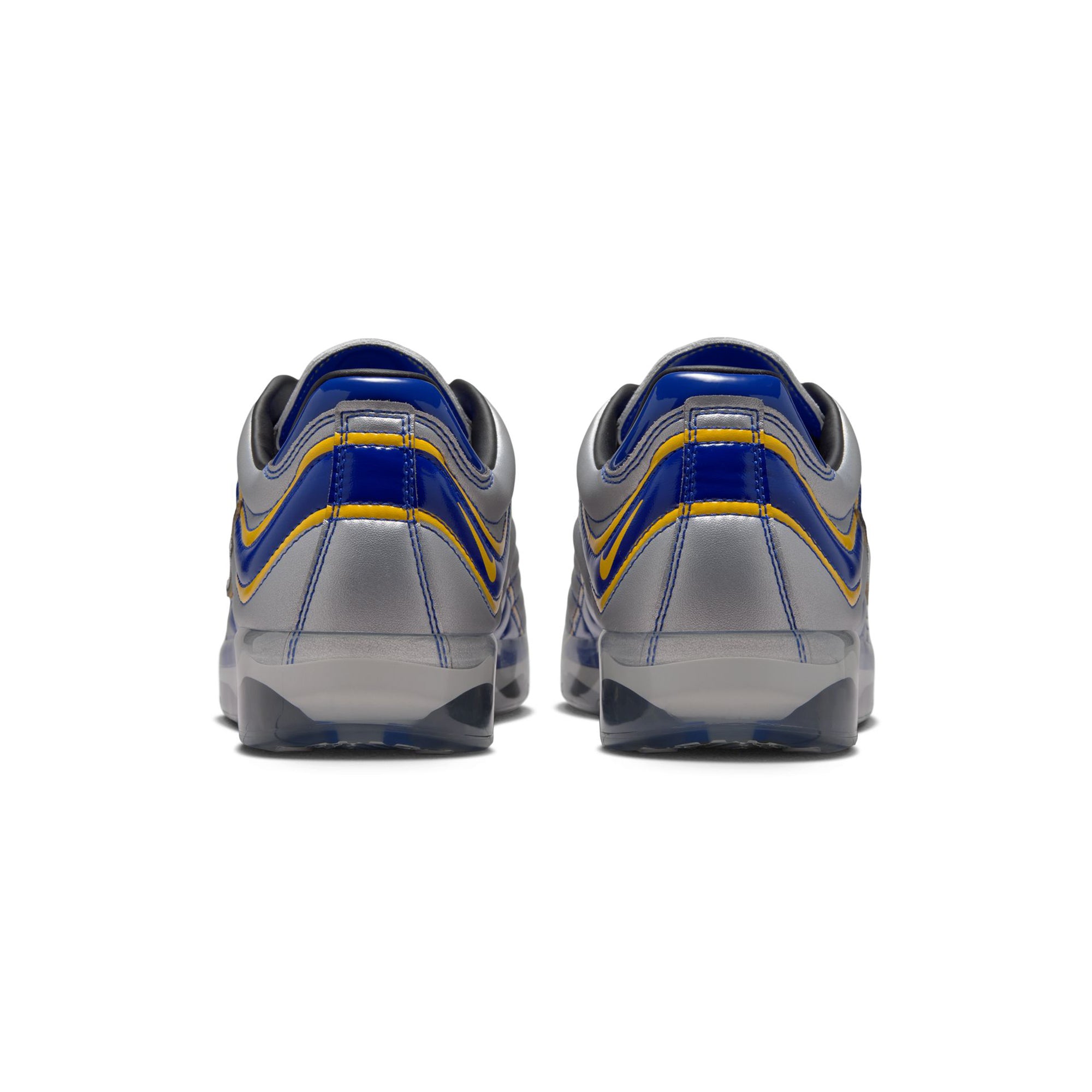Varsity royal yellow and grey sneakers on a white background