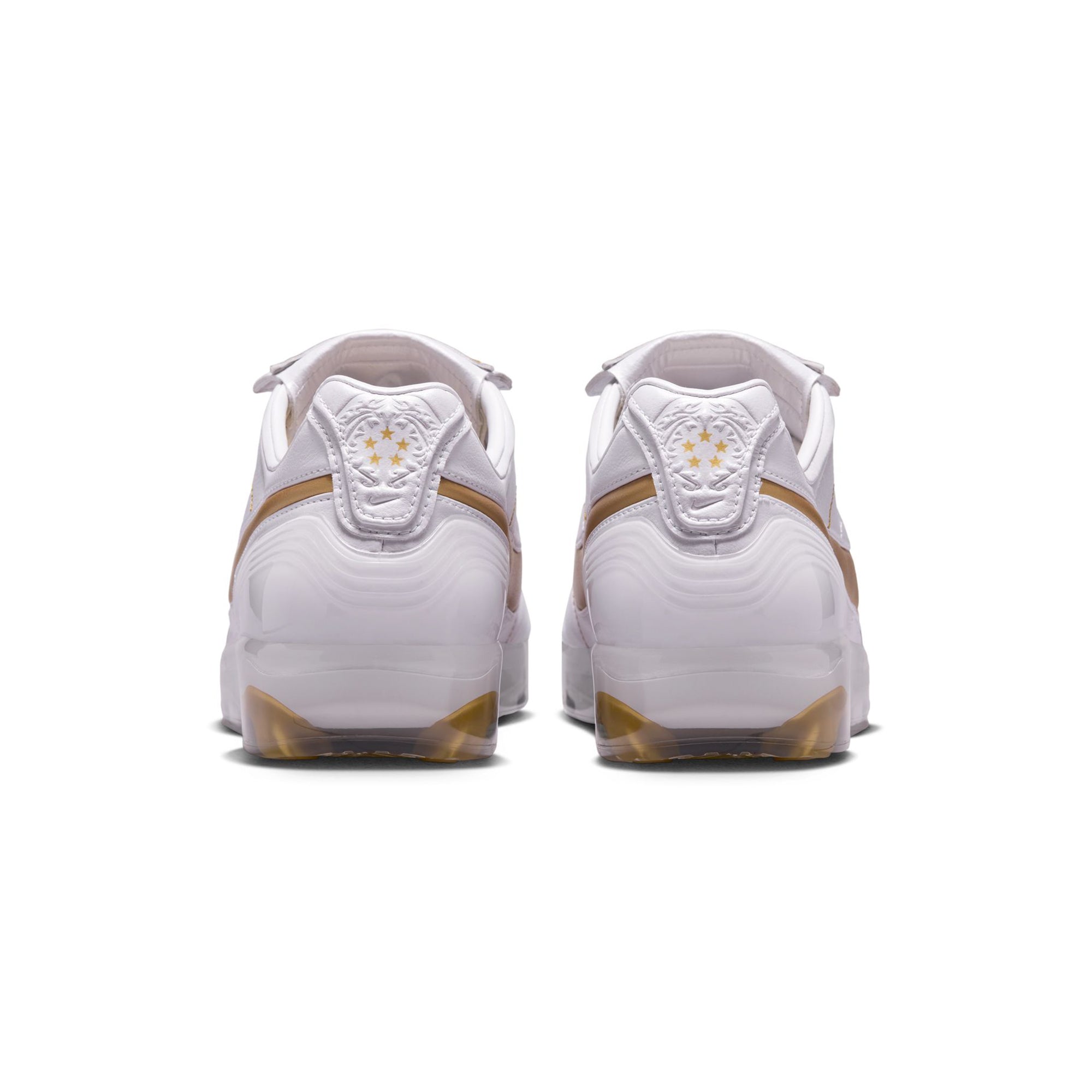 metallic gold-white sneakers on a white background