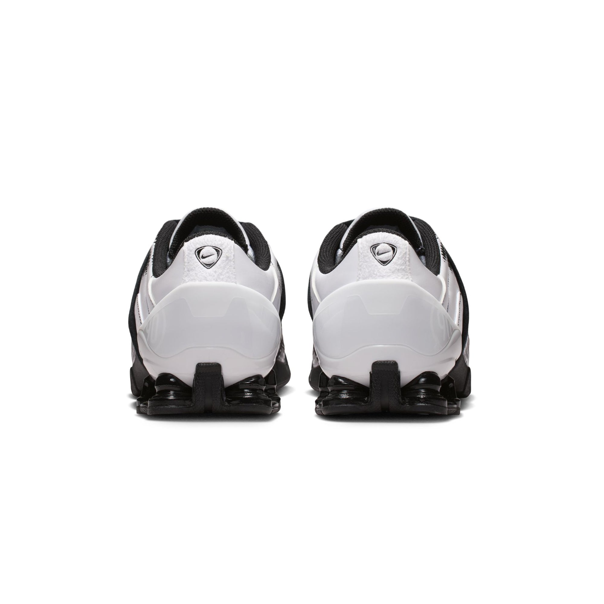 white and black sneakers on a white background