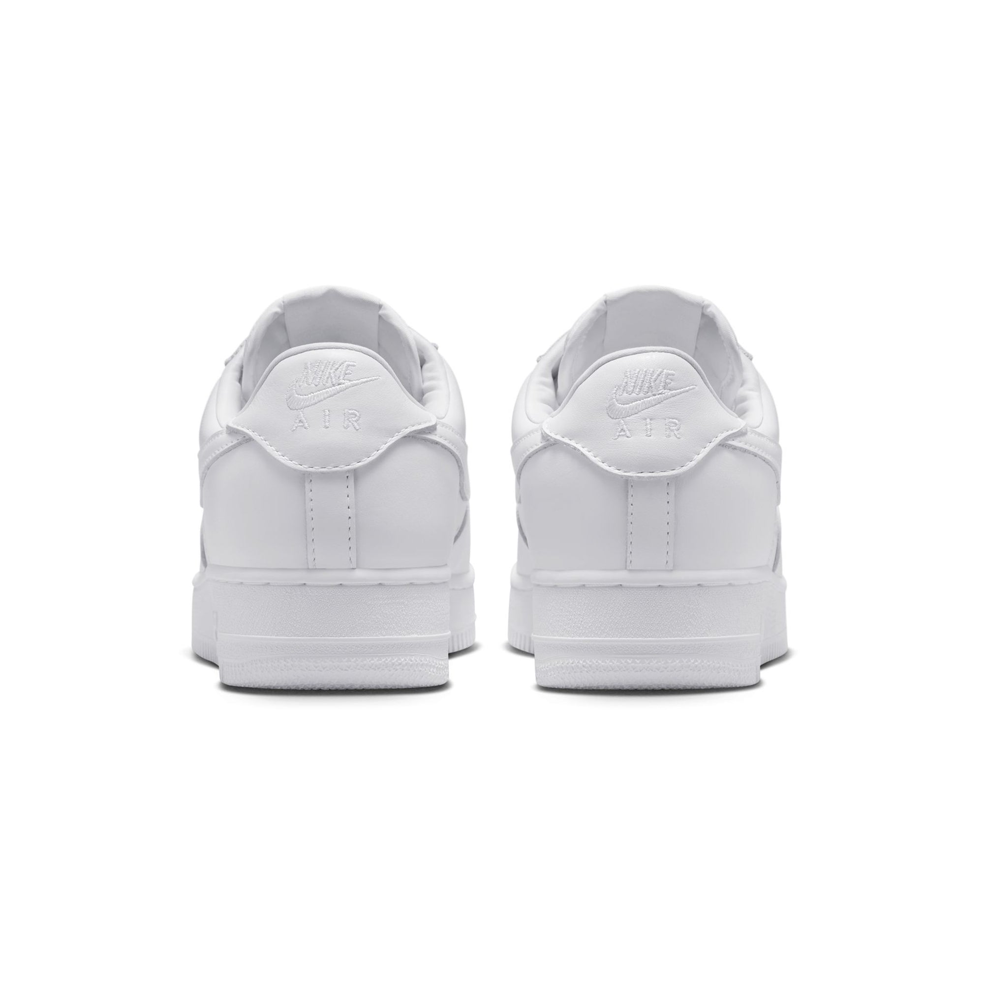White sneakers on a white background