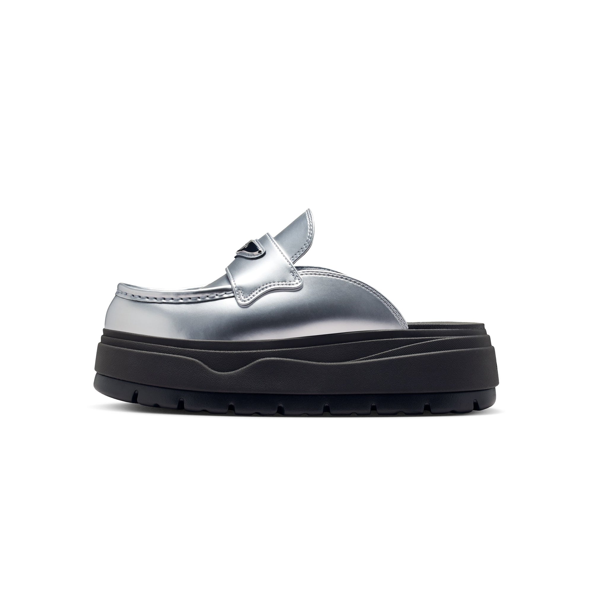 Metallic Silver and black Mule on a white background