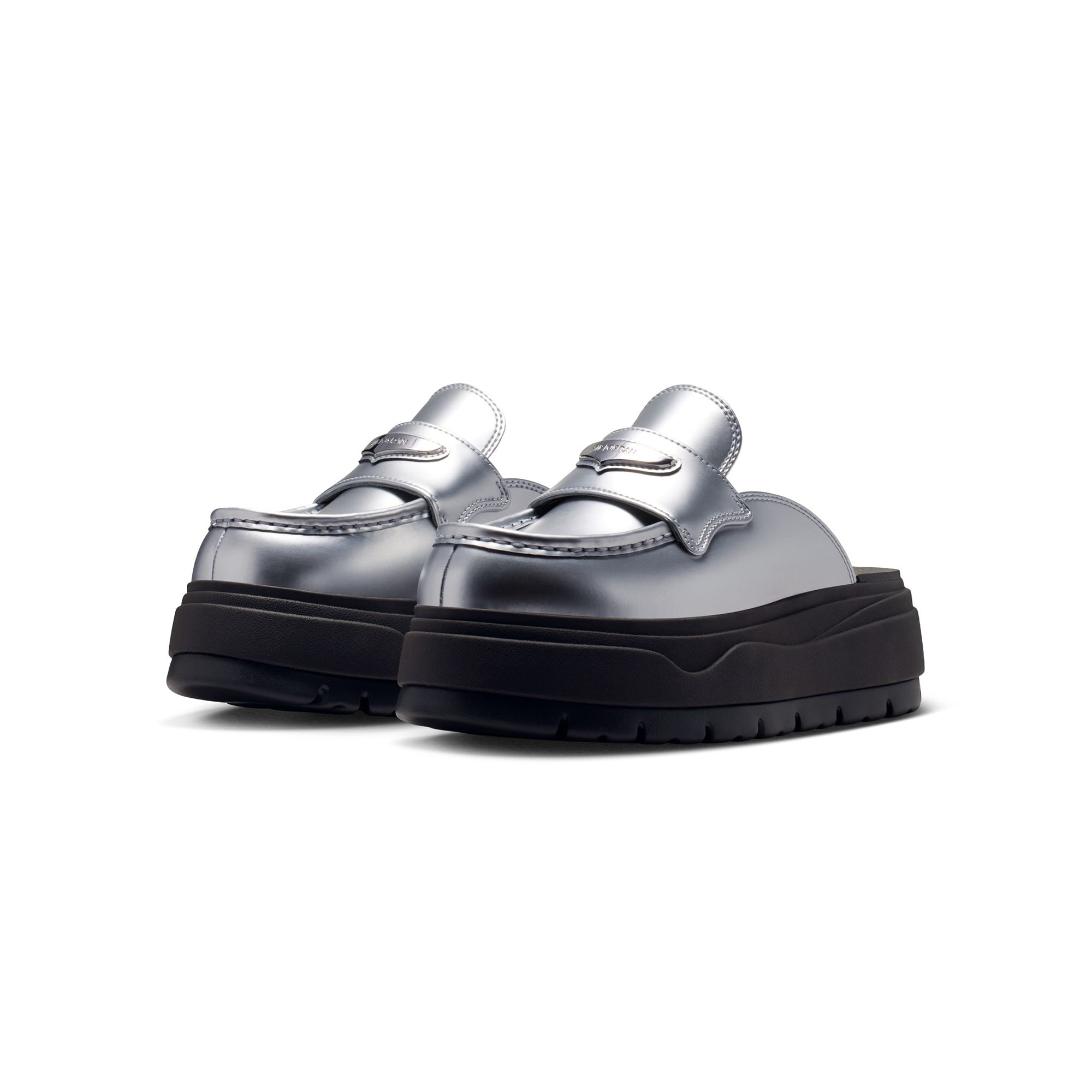 Metallic Silver and black Mule on a white background