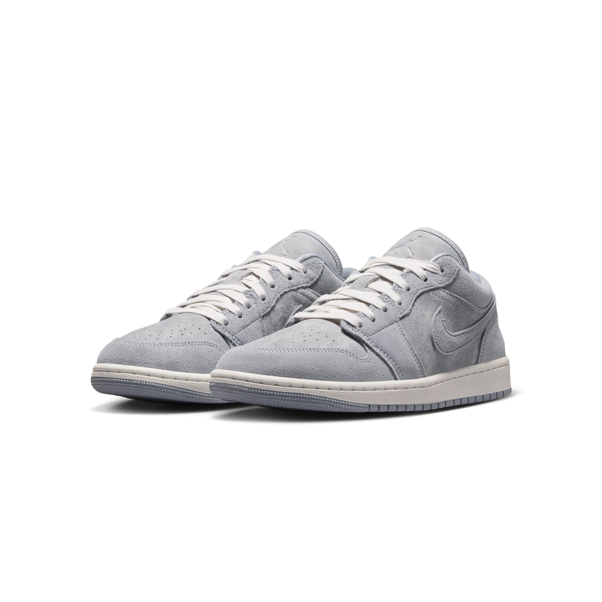 blue grey and white sneakers on a white background