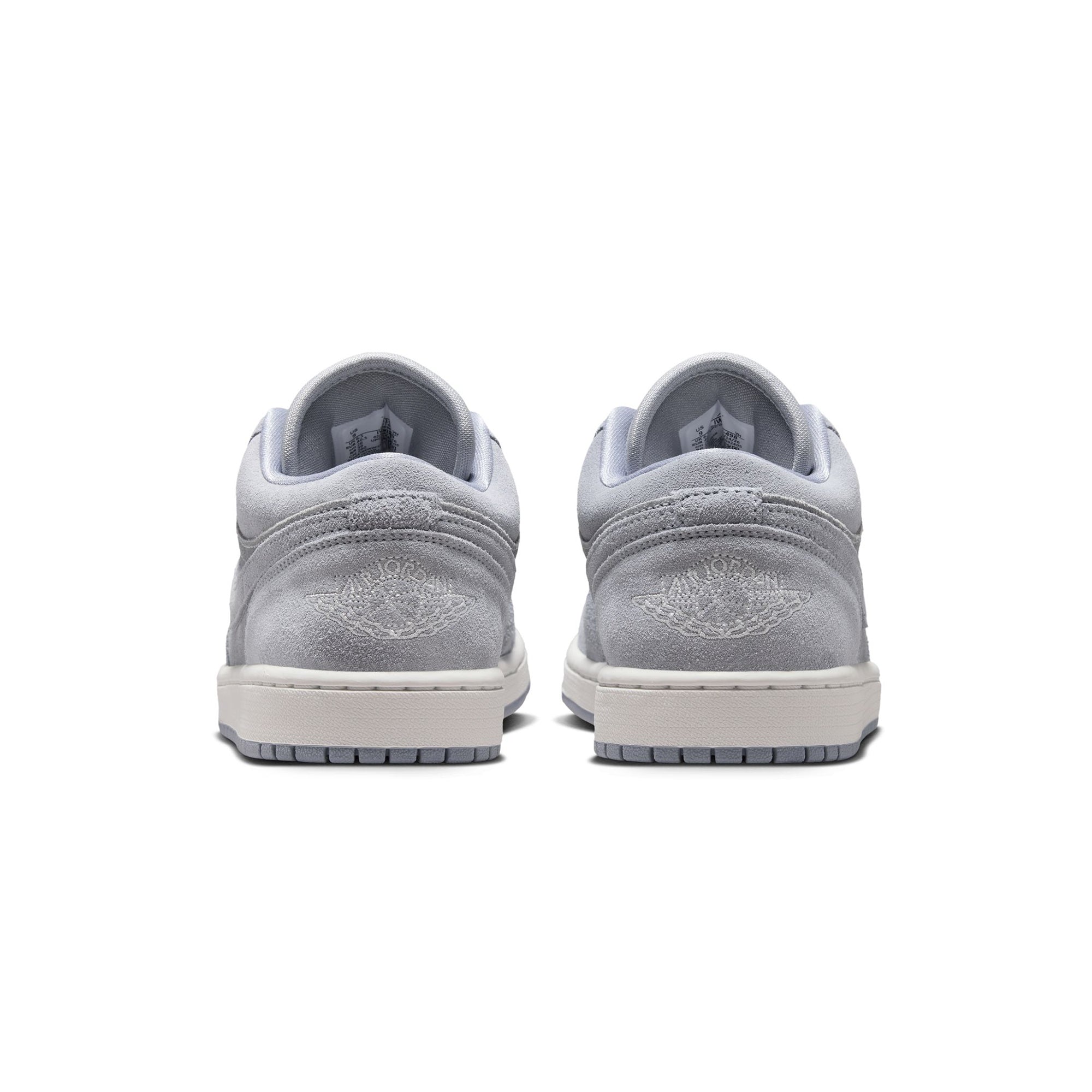 blue grey and white sneakers on a white background