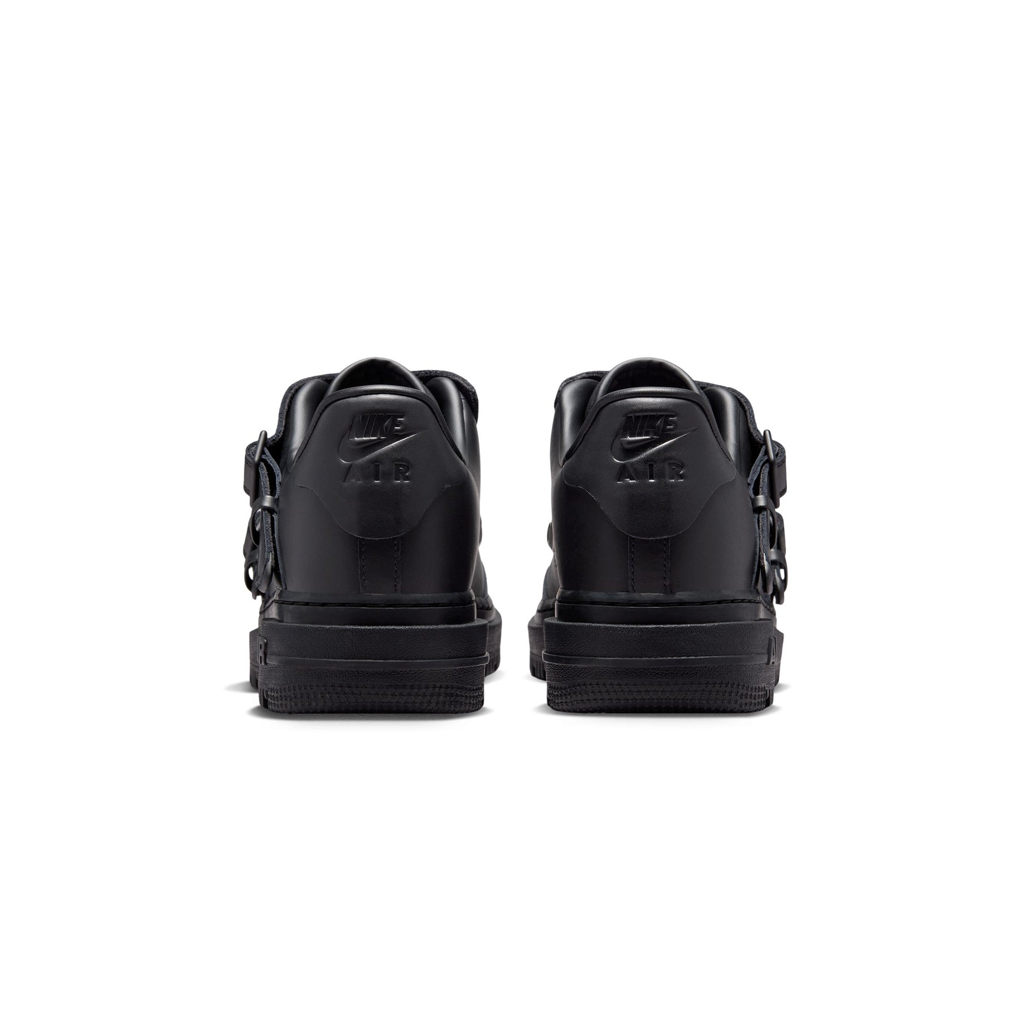 black sneakers on a white background