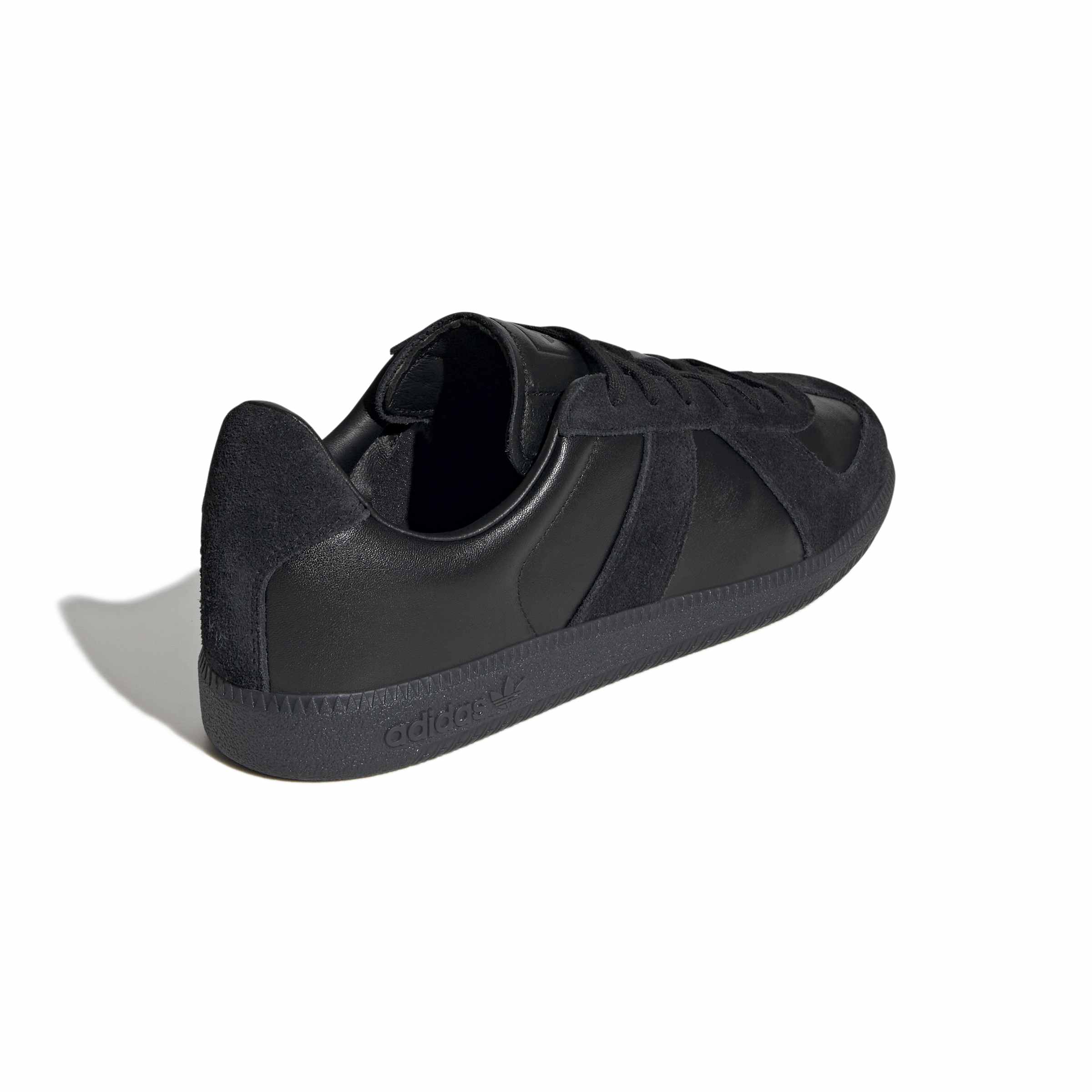 black sneakers on a white background