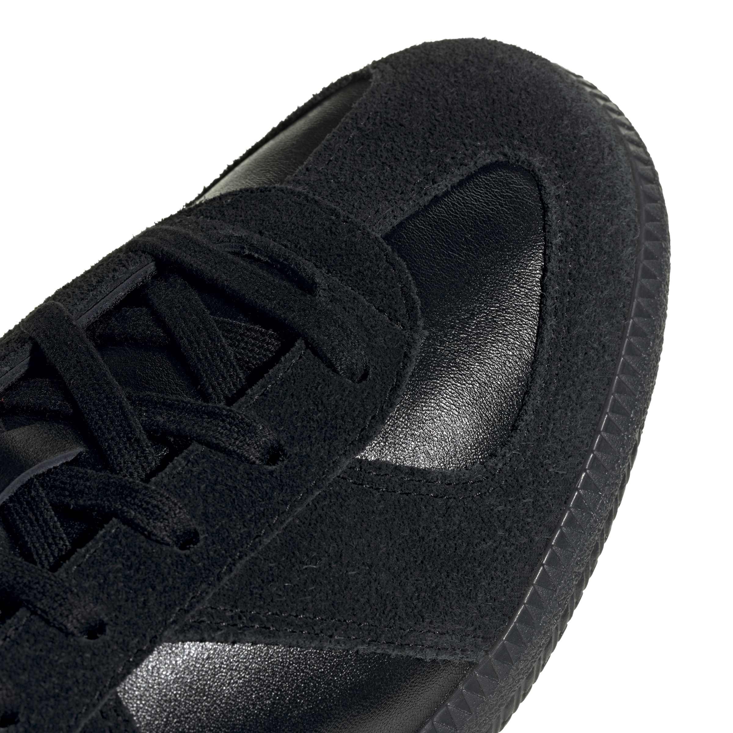 black sneakers on a white background