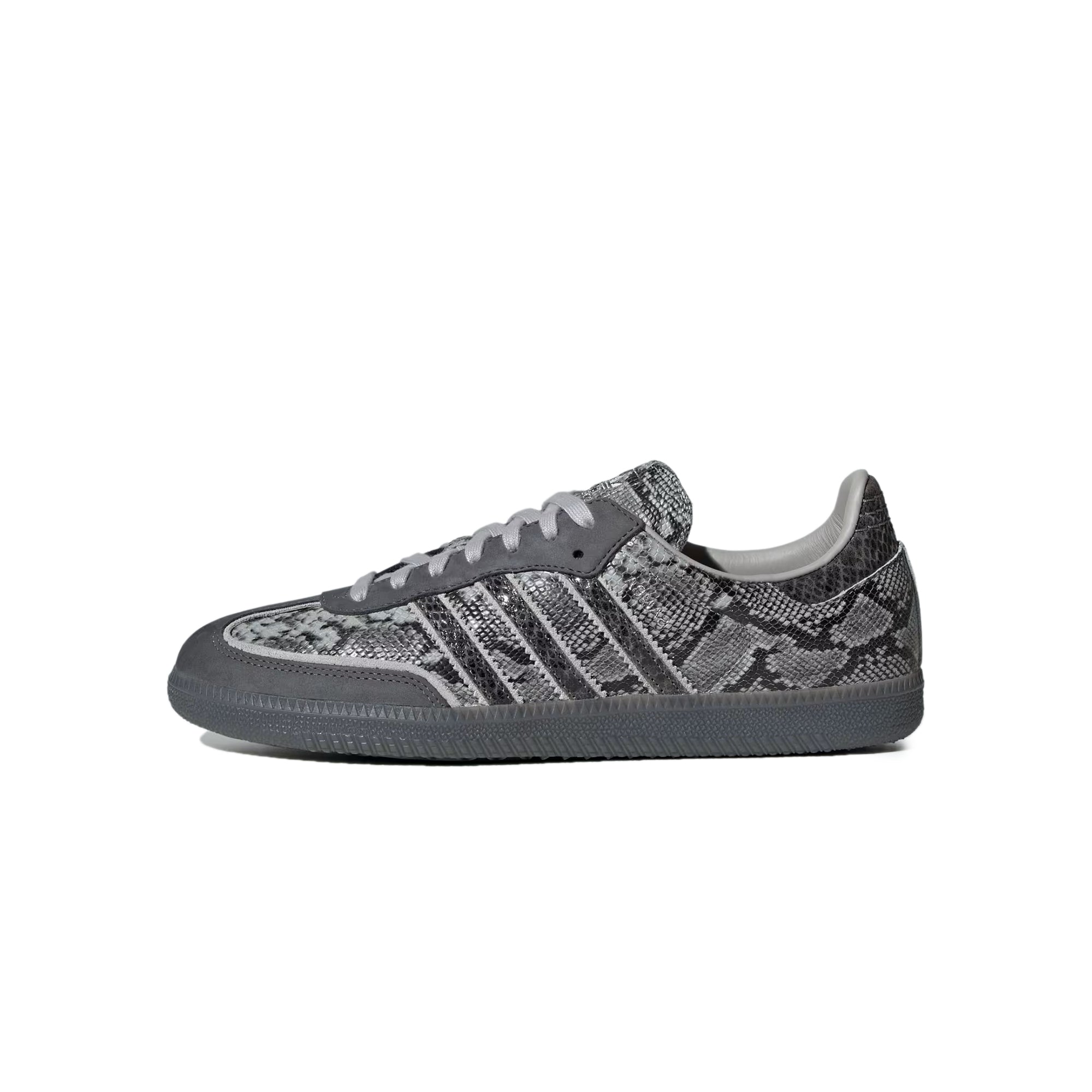grey snake printed sneakers on a white background