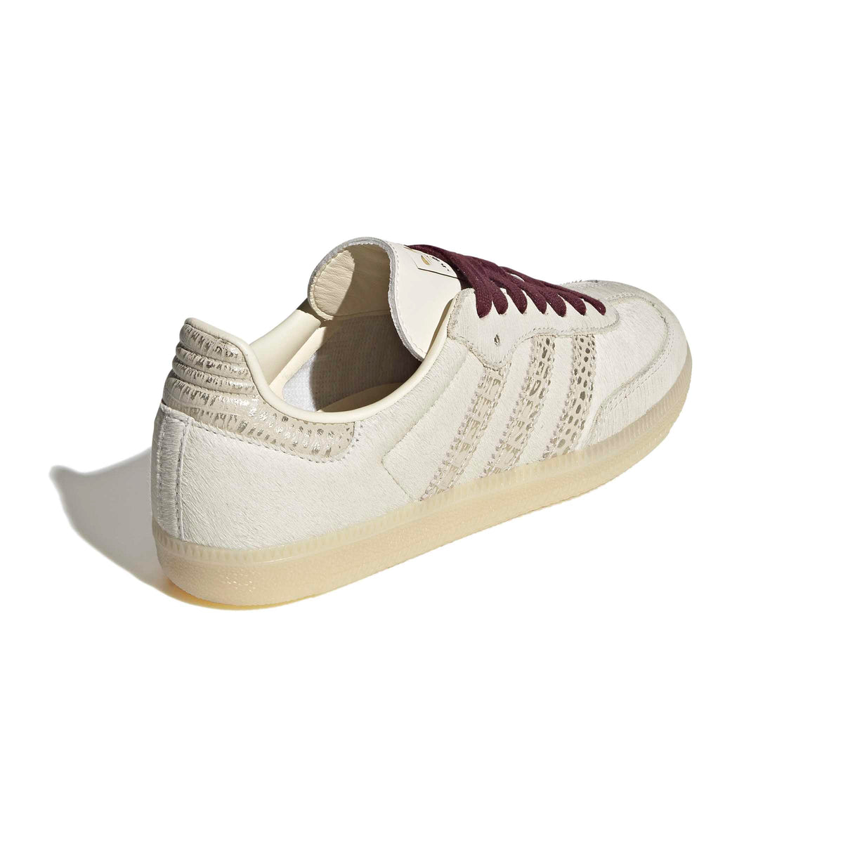 Cream White/ Maroon Sneakers on a white background