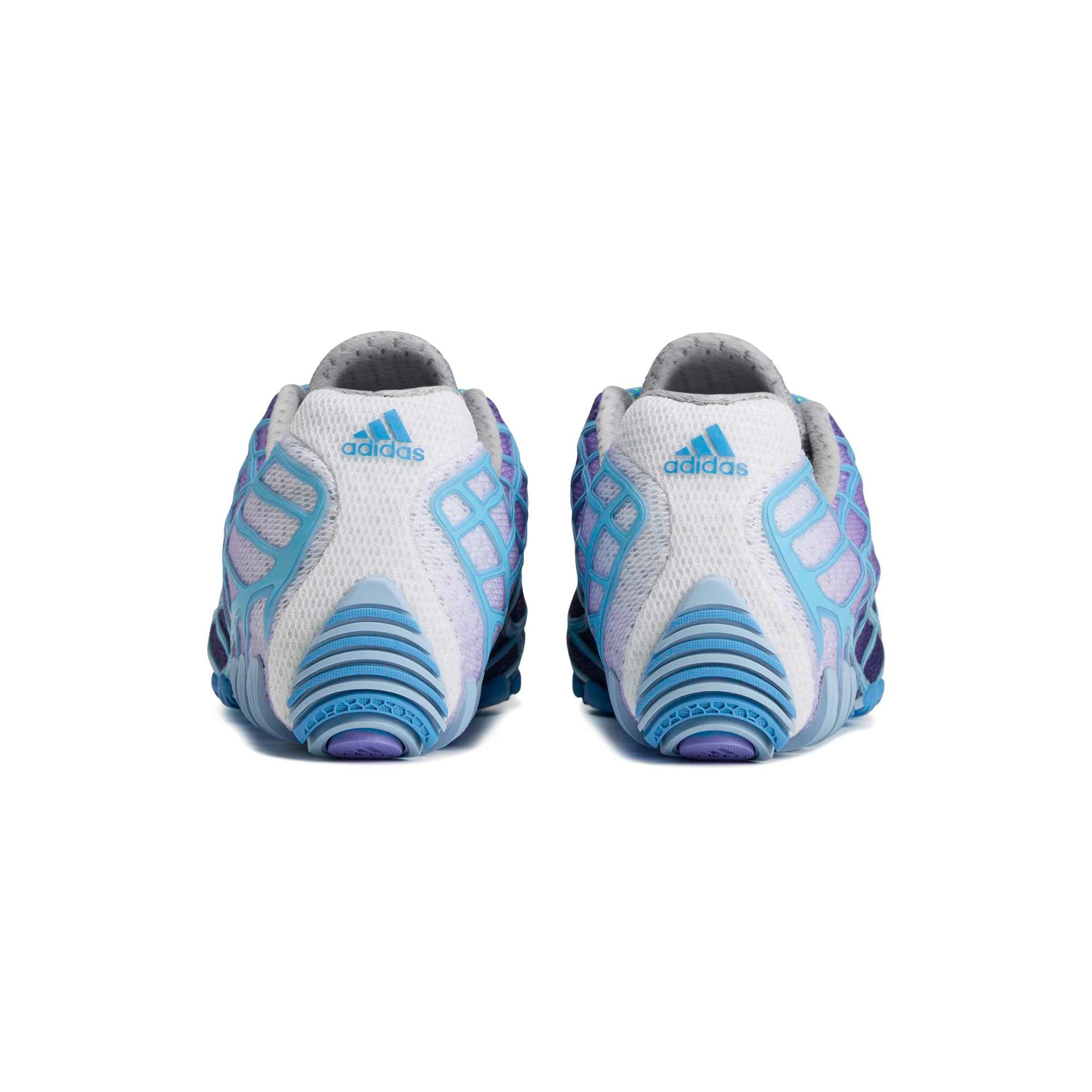 blue, purple and grey sneakers on a white background