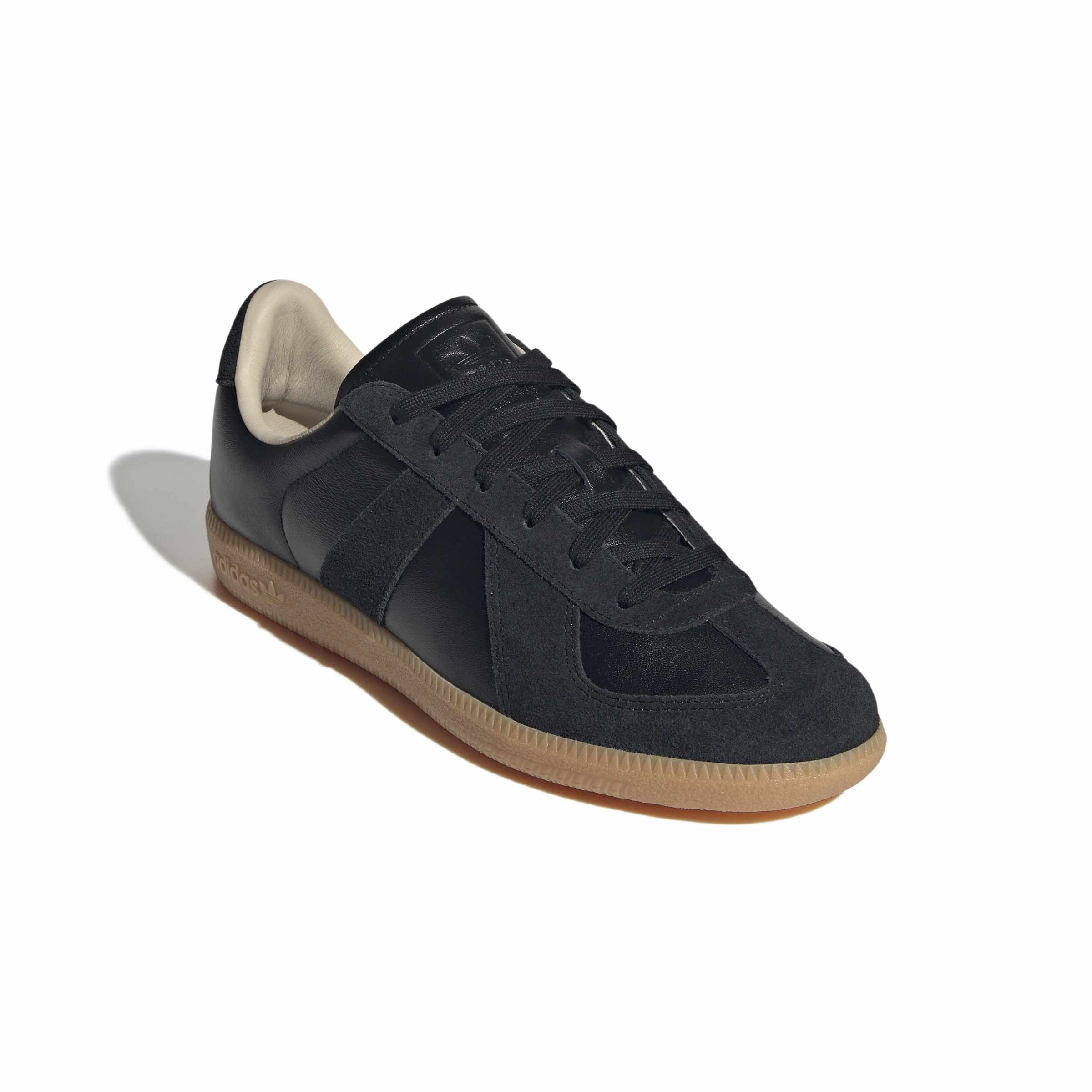 Core Black / Gum Sneakers on a white background