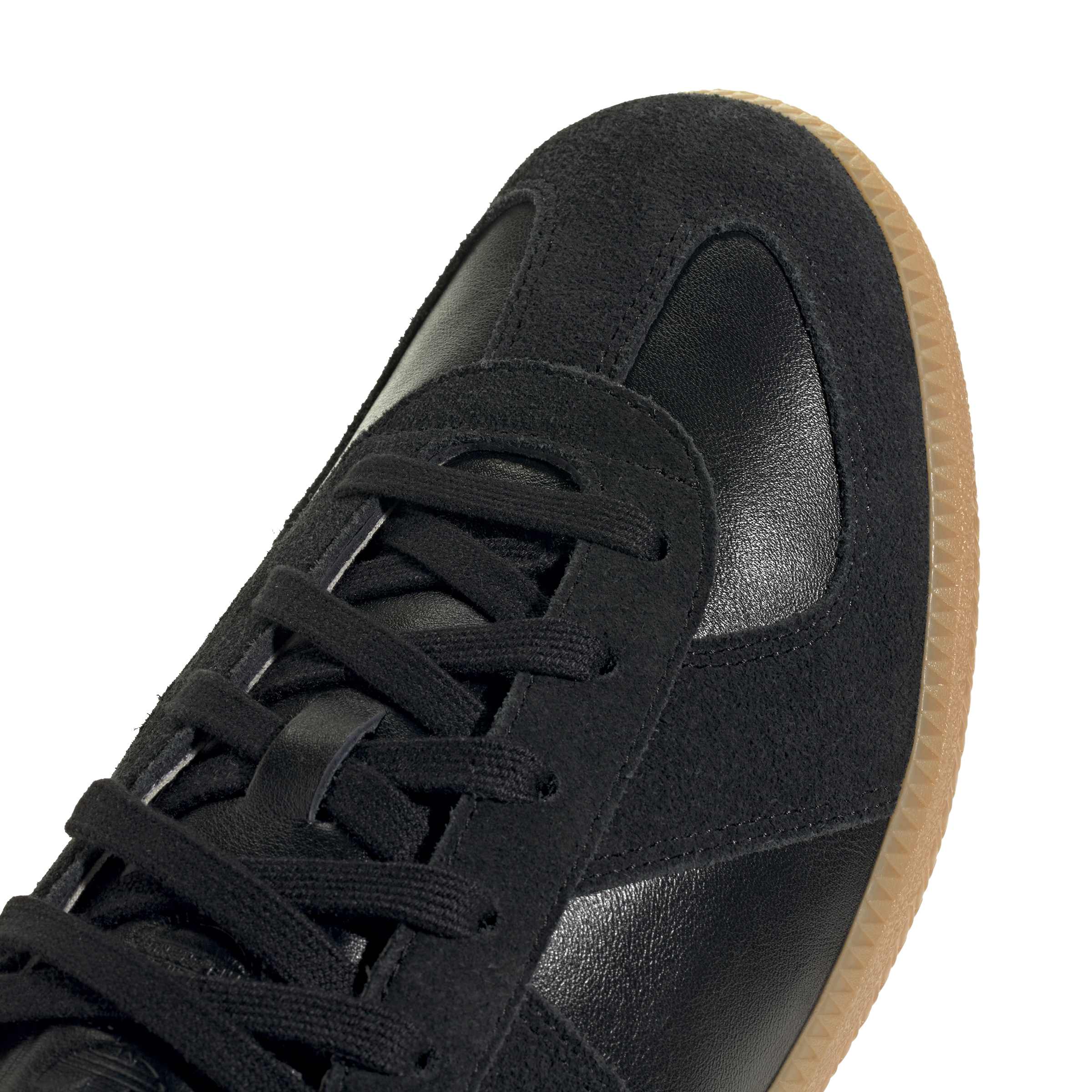 Core Black / Gum Sneakers on a white background