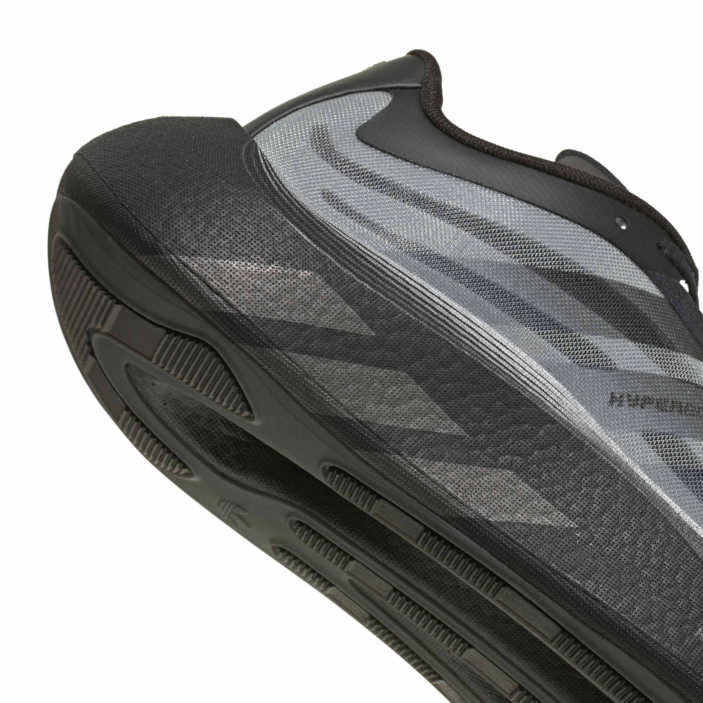 Core Black/ White / Black Sneakers on a white background