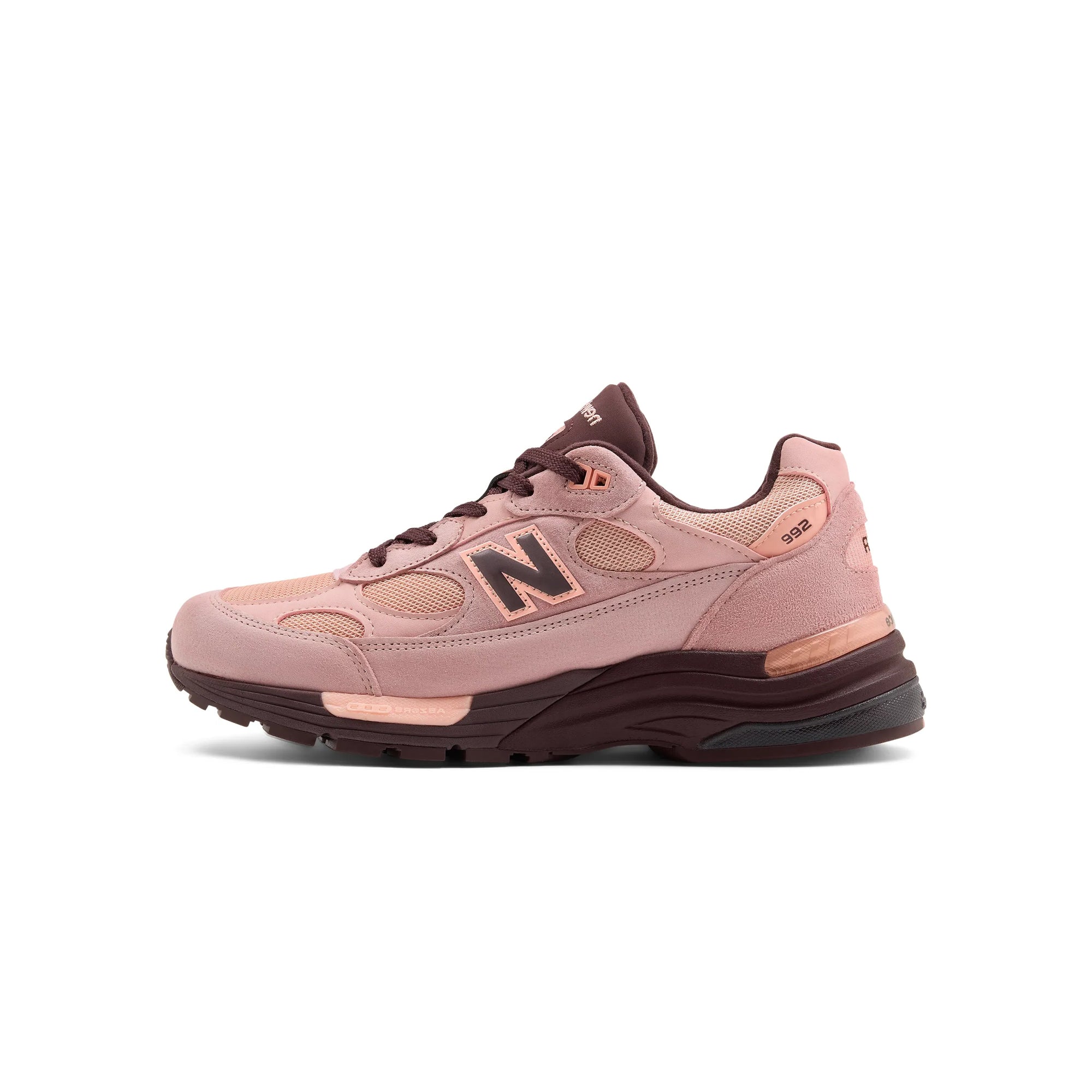 pink and brown sneakers on a white background