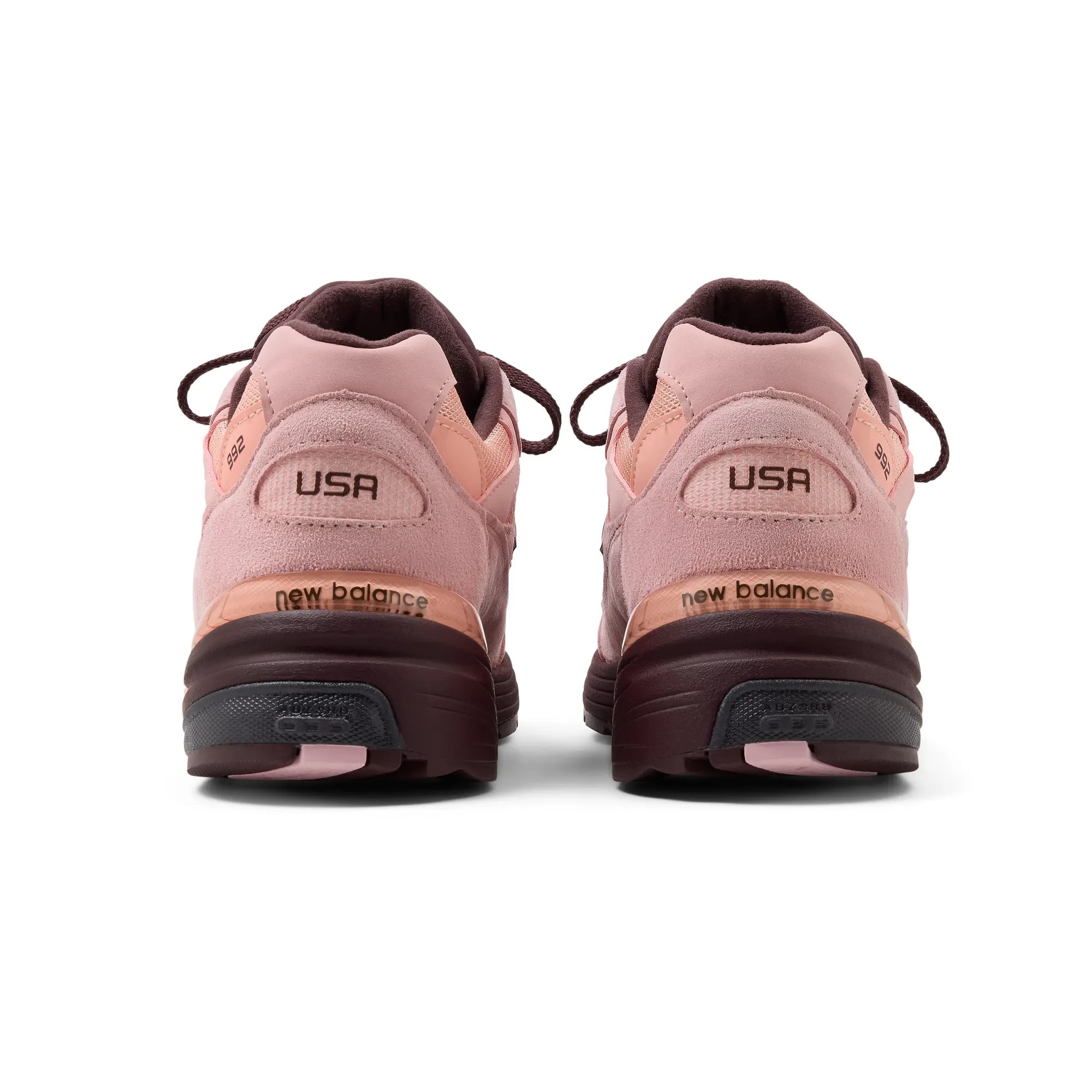 pink and brown sneakers on a white background