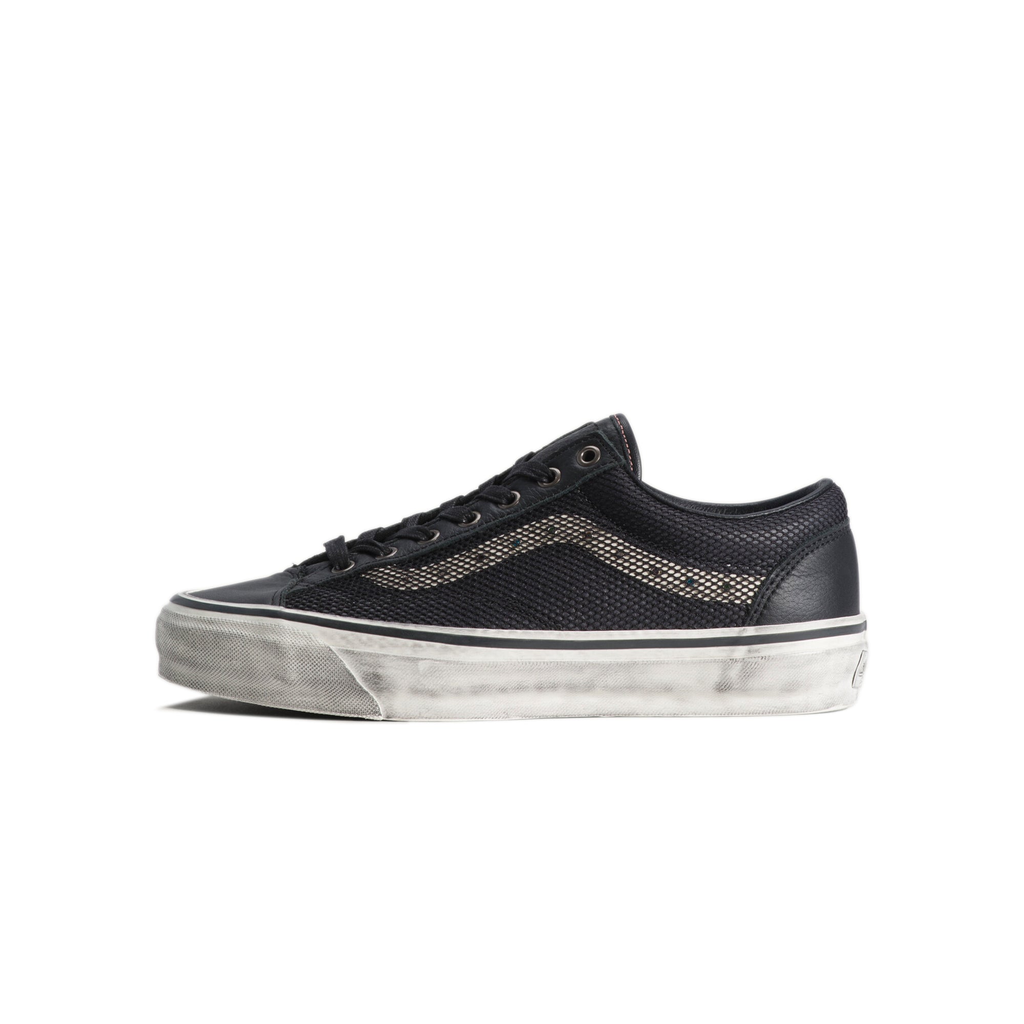 black and white sneakers on a white background