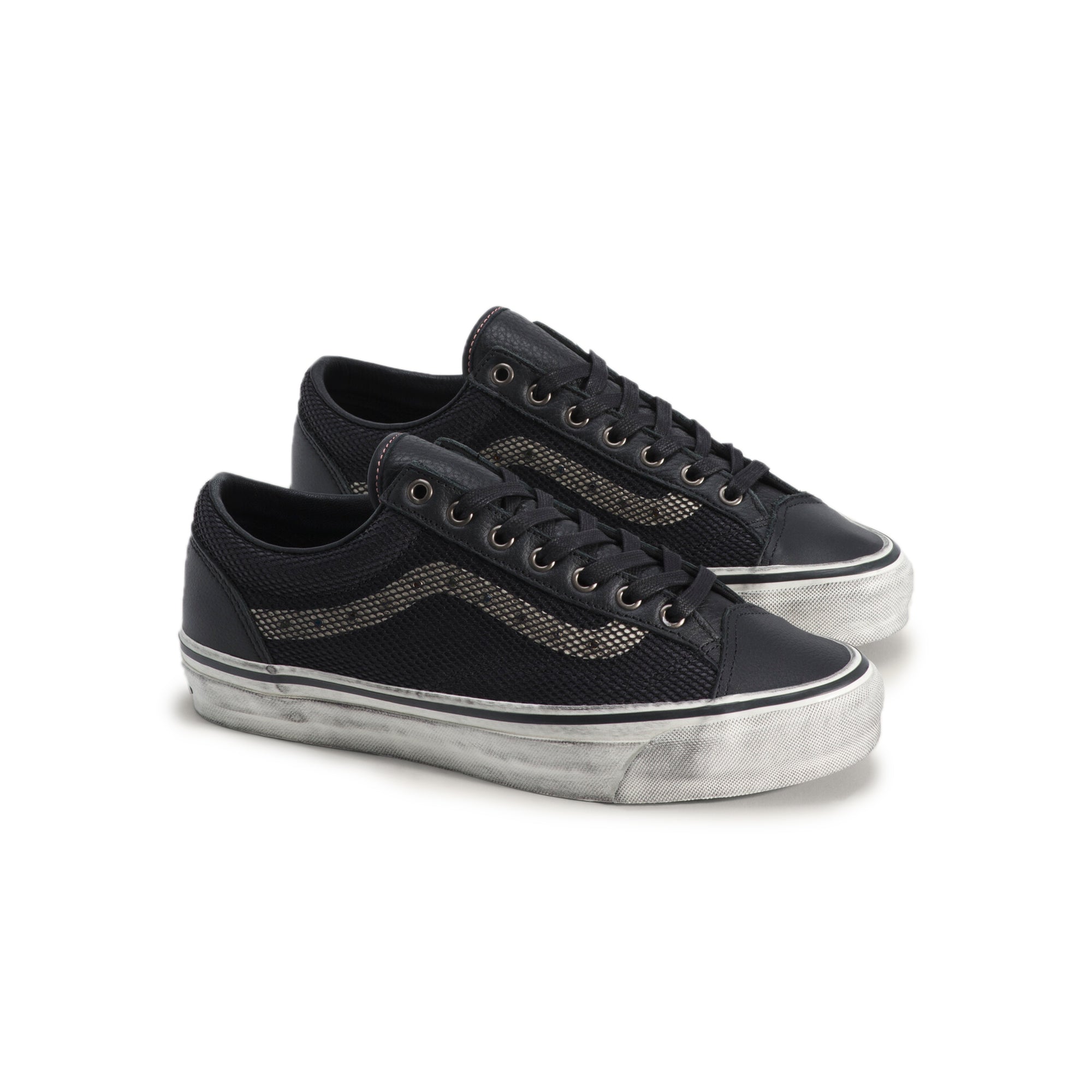black and white sneakers on a white background