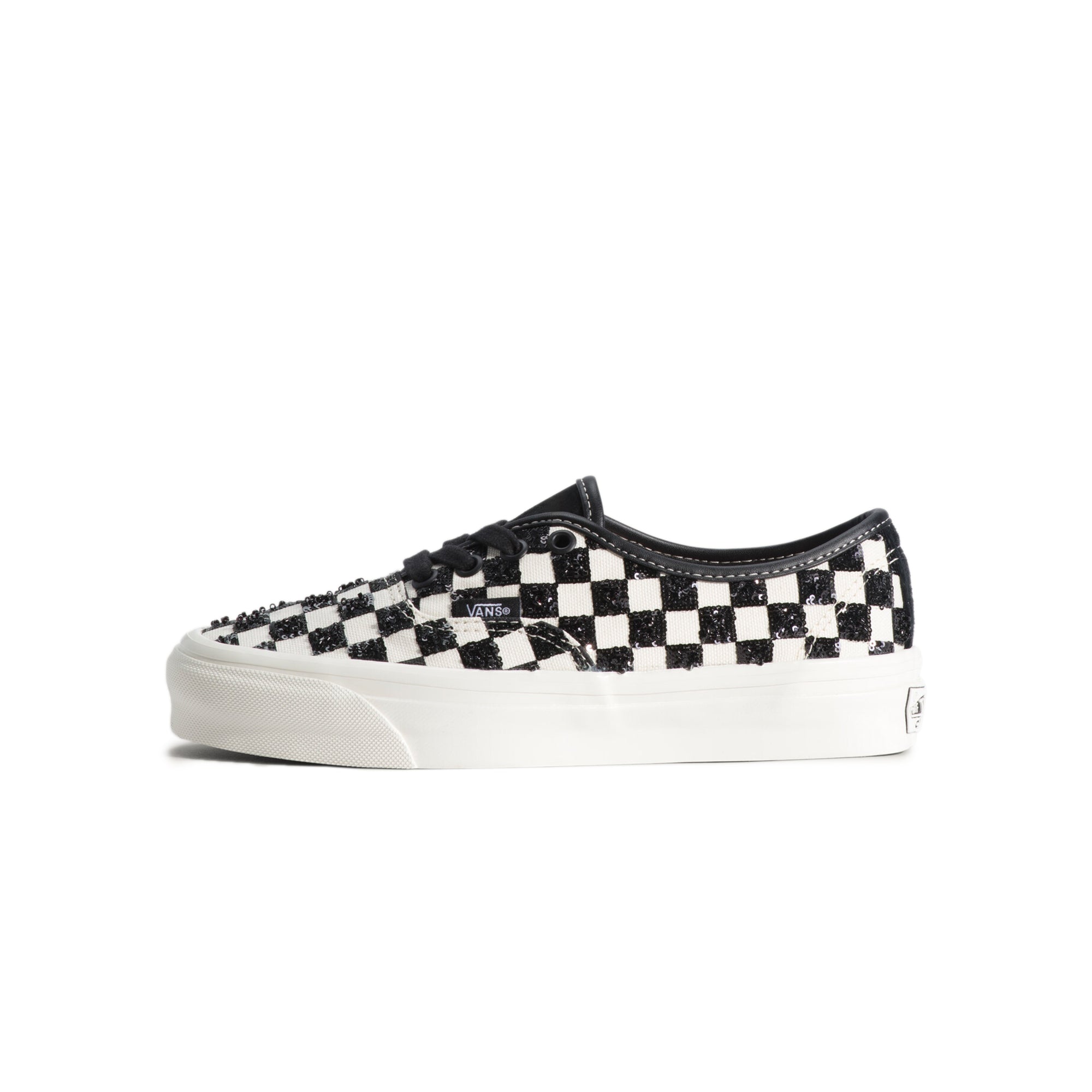 Checkerboard Black Sneakers on a white background