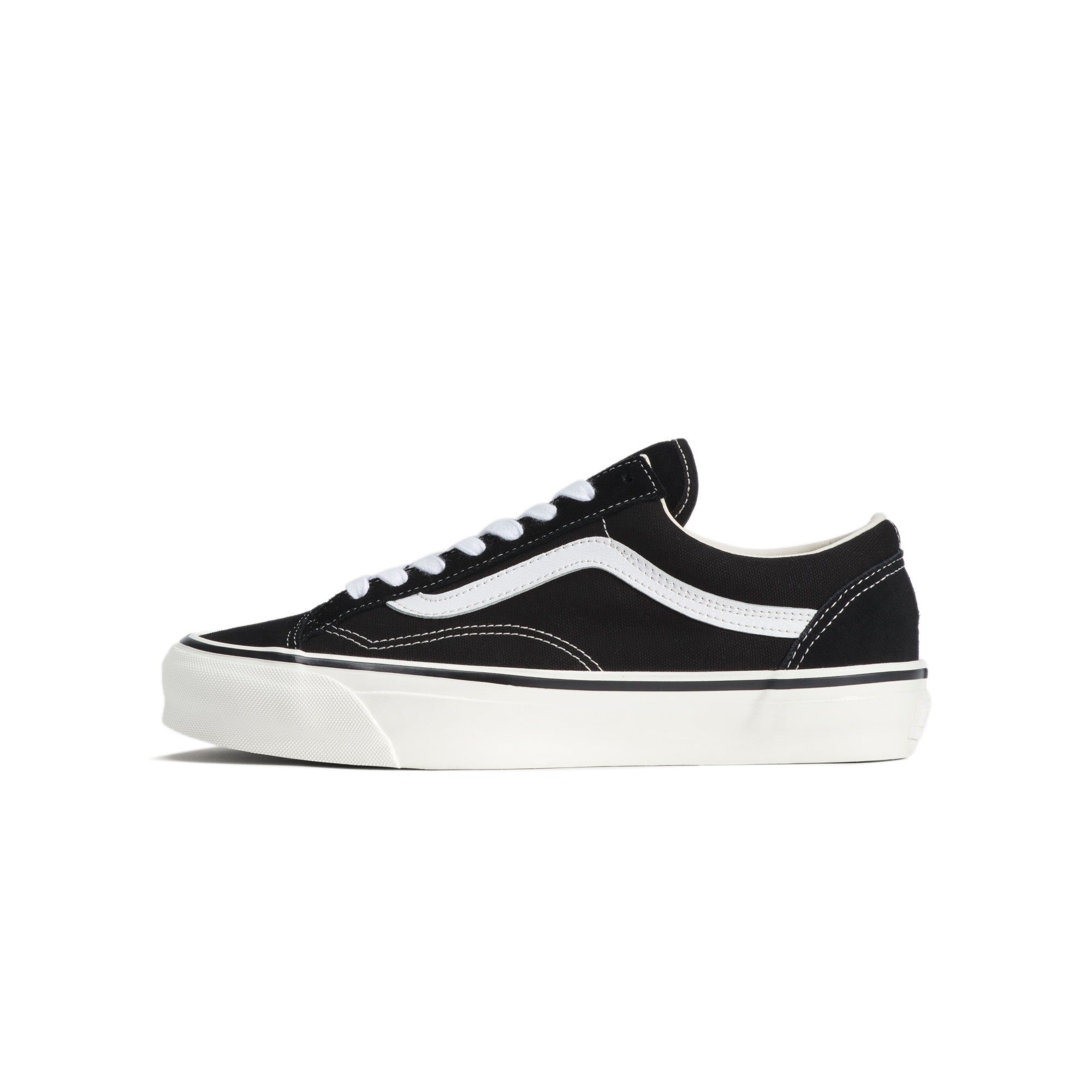 black and white sneakers on a white background