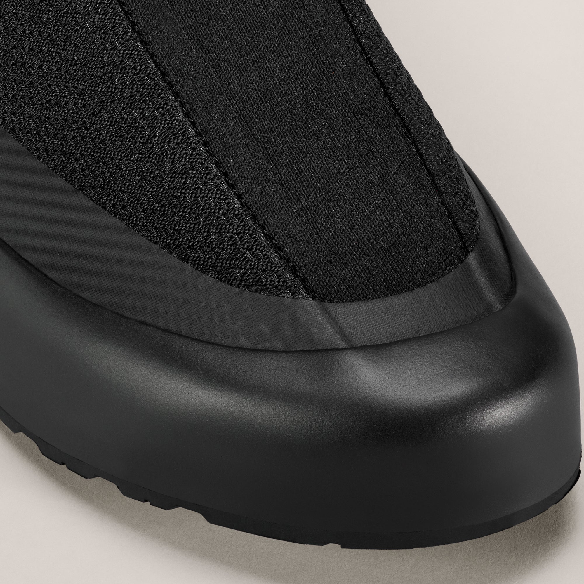 black sneakers on a white background