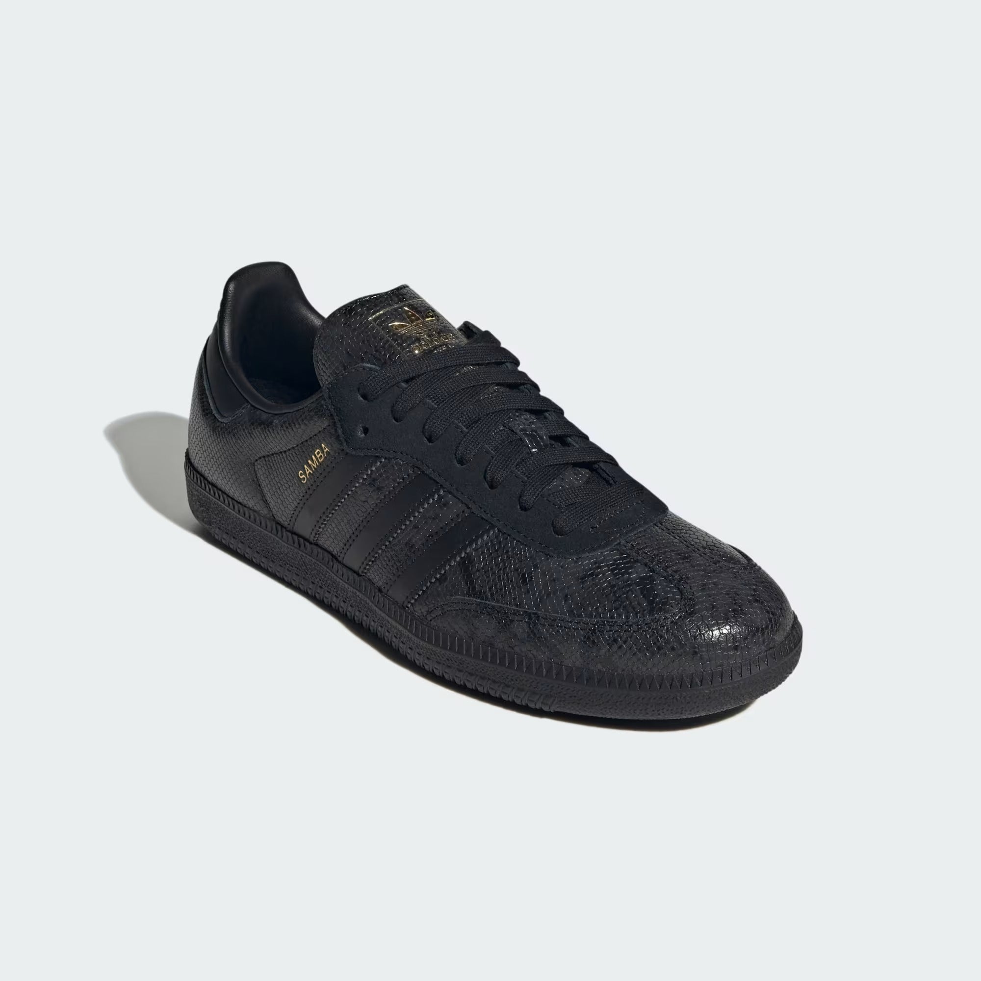 Core Black Sneakers on a white background