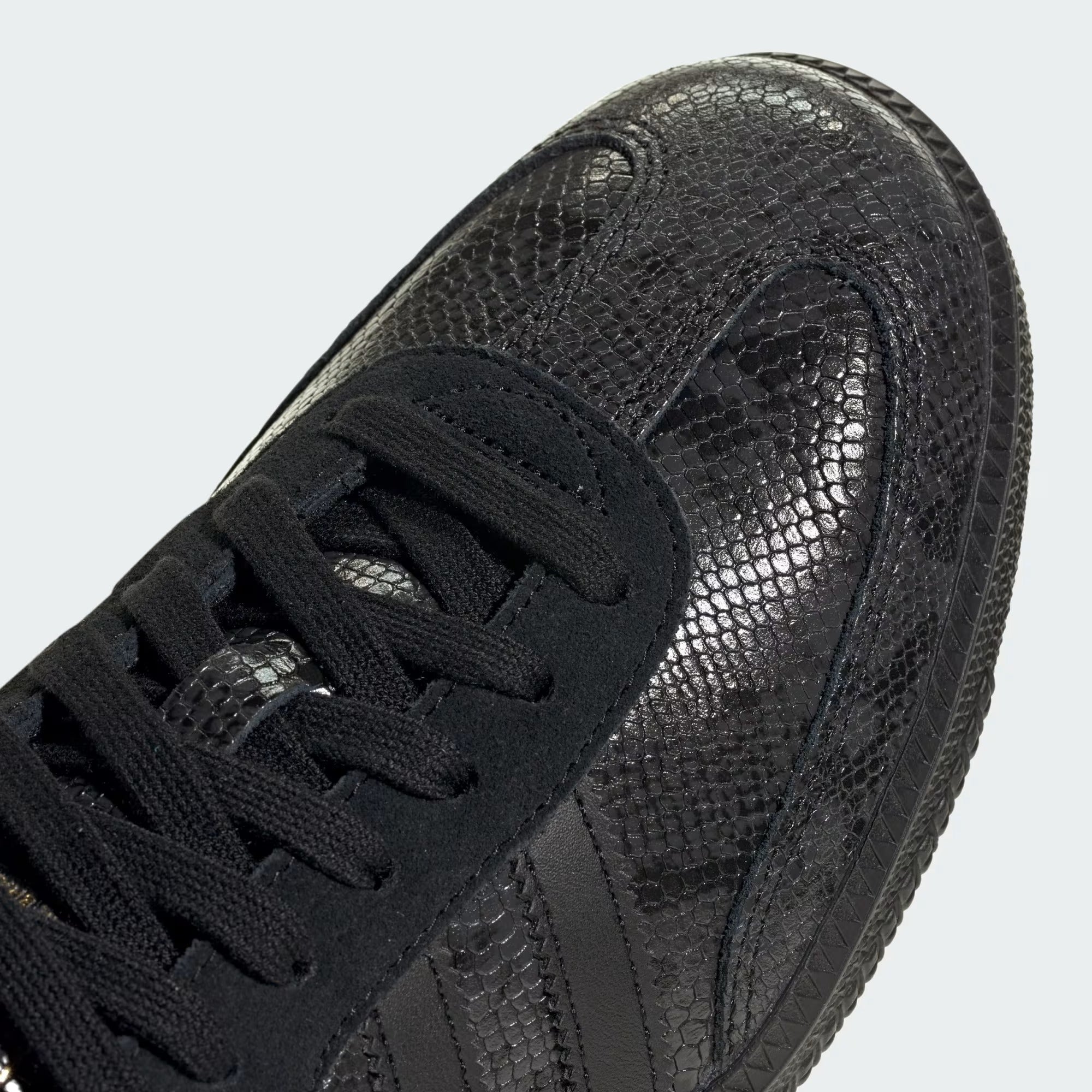 Core Black Sneakers on a white background
