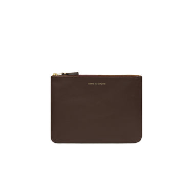 Comme Des Garcon Wallet: Classic Leather Line Clutch in Brown